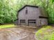 Exterior view of the detached garage with two bays and extra storage at 5109 Goldcrest Dr, Indian Trail, NC 28079