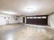 Spacious garage with shelving and ample room for parking and storage at 5109 Goldcrest Dr, Indian Trail, NC 28079