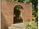 Brick walled garden entrance, offering privacy and a touch of elegance to the property at 5109 Goldcrest Dr, Indian Trail, NC 28079