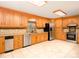 Bright kitchen with light wood cabinets, stainless steel appliances, and a functional layout at 5109 Goldcrest Dr, Indian Trail, NC 28079