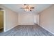 Inviting bedroom boasting a ceiling fan, neutral walls, and sleek new flooring at 5436 Scarlet Sage Dr, Charlotte, NC 28215