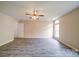 Comfortable bedroom featuring a ceiling fan, neutral walls, and new flooring at 5436 Scarlet Sage Dr, Charlotte, NC 28215