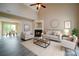 Bright and airy living room with a fireplace, vaulted ceiling, and stylish furnishings at 5436 Scarlet Sage Dr, Charlotte, NC 28215