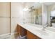 Bathroom features a double sink, an oversized mirror and vanity lighting at 6303 Trevor Simpson Dr, Indian Trail, NC 28079