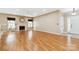 Spacious living room with fireplace and large windows. Freshly painted with neutral tones at 6303 Trevor Simpson Dr, Indian Trail, NC 28079