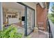 The balcony provides outdoor space and a glimpse into the living area and kitchen at 715 N Church St # 310, Charlotte, NC 28202