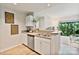 Modern kitchen with stainless appliances, ample cabinet space, and open view to living area at 715 N Church St # 310, Charlotte, NC 28202