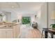 Bright living room featuring hardwood floors, large windows, and a modern, neutral color palette at 715 N Church St # 310, Charlotte, NC 28202