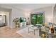 Inviting living room featuring a balcony view, contemporary furnishings, and wood-look flooring at 715 N Church St # 310, Charlotte, NC 28202