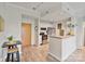Open-concept kitchen and living area featuring modern finishes and ample natural light at 715 N Church St # 310, Charlotte, NC 28202