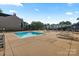 Outdoor pool with lounge chairs offers a relaxing area for residents and guests at 715 N Church St # 310, Charlotte, NC 28202