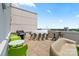 Spacious rooftop terrace with seating, a grill, and a scenic view at 715 N Church St # 310, Charlotte, NC 28202