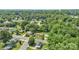 An aerial view displays single Gathering homes surrounded by lush greenery and mature trees in a neighborhood setting at 798 Wilson St, China Grove, NC 28023