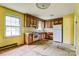 Outdated kitchen with vintage appliances and cabinetry, in need of renovation at 798 Wilson St, China Grove, NC 28023