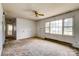 Open living room featuring carpeted floors, bare walls, and natural light at 798 Wilson St, China Grove, NC 28023