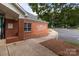 Brick clubhouse exterior, offering swim and tennis amenities in a well-maintained community at 8906 Pickering Grove Ln, Charlotte, NC 28216
