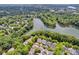 Community aerial view with homes and a lake at 104 Edgewater Park St, Davidson, NC 28036
