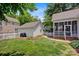 Spacious backyard featuring a white picket fence and well-kept greenery at 104 Edgewater Park St, Davidson, NC 28036
