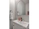 Modern bathroom featuring a bright sink, mirror, and stylish fixtures at 104 Edgewater Park St, Davidson, NC 28036