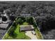 Aerial view highlighting the home's location, sizable yard, parking and a treed boundary at 10672 Barberville Rd, Fort Mill, SC 29707