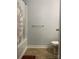 Bathroom with tub and patterned shower curtain at 10672 Barberville Rd, Fort Mill, SC 29707