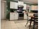 Well-equipped kitchen featuring white cabinets, stainless steel appliances, and ample countertop space at 10672 Barberville Rd, Fort Mill, SC 29707