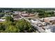 Aerial view of city streets with shops, buildings, and neighborhood traffic at 108 Forrester Ave, Belmont, NC 28012