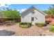 Charming backyard featuring a detached garage and a brick-paved patio area at 108 Forrester Ave, Belmont, NC 28012