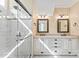 Bathroom featuring frameless shower and double vanity with granite countertop and neutral sinks at 108 Forrester Ave, Belmont, NC 28012