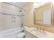 Bathroom featuring shower over tub combination and a vanity with granite countertop and neutral sink at 108 Forrester Ave, Belmont, NC 28012