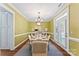 Elegant dining room with natural light, stylish furniture, and a serene atmosphere at 108 Forrester Ave, Belmont, NC 28012