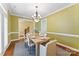 Elegant dining room with natural light, stylish furniture, and a serene atmosphere at 108 Forrester Ave, Belmont, NC 28012