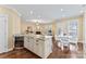Spacious kitchen island connects the kitchen with the cozy living room and bright dining area at 108 Forrester Ave, Belmont, NC 28012
