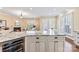 Kitchen island features granite countertops, wine cooler, and ample storage space at 108 Forrester Ave, Belmont, NC 28012