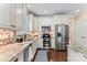 Well-equipped kitchen with stainless steel appliances, granite countertops, and tile backsplash at 108 Forrester Ave, Belmont, NC 28012