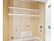 Functional laundry room with white wire shelving and washer/dryer hookups at 108 Forrester Ave, Belmont, NC 28012