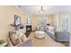 Cozy living room with a fireplace, comfortable seating, and stylish decor at 108 Forrester Ave, Belmont, NC 28012