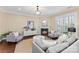 Cozy living room features a fireplace, comfortable seating, and natural light at 108 Forrester Ave, Belmont, NC 28012