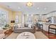 Open-concept living room flowing into the kitchen, perfect for entertaining and modern living at 108 Forrester Ave, Belmont, NC 28012