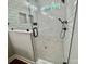 Modern bathroom with glass shower, shower niche, matte black hardware, hexagon shower floor and subway tile at 1143 Journey Ln, Salisbury, NC 28146