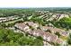Expansive aerial view of community complex features tree-lined streets and ample parking at 11911 Ridgeway Park Dr, Charlotte, NC 28277