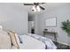 Cozy bedroom with a decorative blanket and wooden side table at 11911 Ridgeway Park Dr, Charlotte, NC 28277