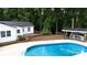 A refreshing pool with deck and bar, perfect for outdoor relaxation and entertainment at 1197 Fincher Rd, Fort Lawn, SC 29714