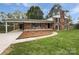 Charming two-story brick home with black shutters and a well-maintained front yard at 1224 Bethlehem Rd, Kings Mountain, NC 28086