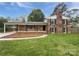 Charming two-story brick home with black shutters and a well-maintained front yard at 1224 Bethlehem Rd, Kings Mountain, NC 28086
