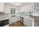 Clean, well-lit kitchen with white cabinets, stainless steel appliances, and an open layout at 1224 Bethlehem Rd, Kings Mountain, NC 28086