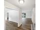 Open-concept living area showcases wood flooring and access to the backyard at 1224 Bethlehem Rd, Kings Mountain, NC 28086