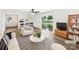 Bright living room featuring modern decor and a sliding door to the backyard at 1224 Bethlehem Rd, Kings Mountain, NC 28086