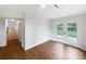Bright living room features double doors, hardwood floors, and stairs in the background at 1224 Bethlehem Rd, Kings Mountain, NC 28086