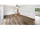 Spacious, naturally lit living room featuring wood floors and stairs to the second floor at 1224 Bethlehem Rd, Kings Mountain, NC 28086